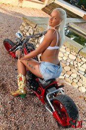 Hot Young Evelyn Strips Off Her Denim Skirts 01