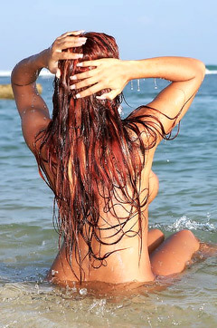 Ashley Bulgary Strips On The Beach